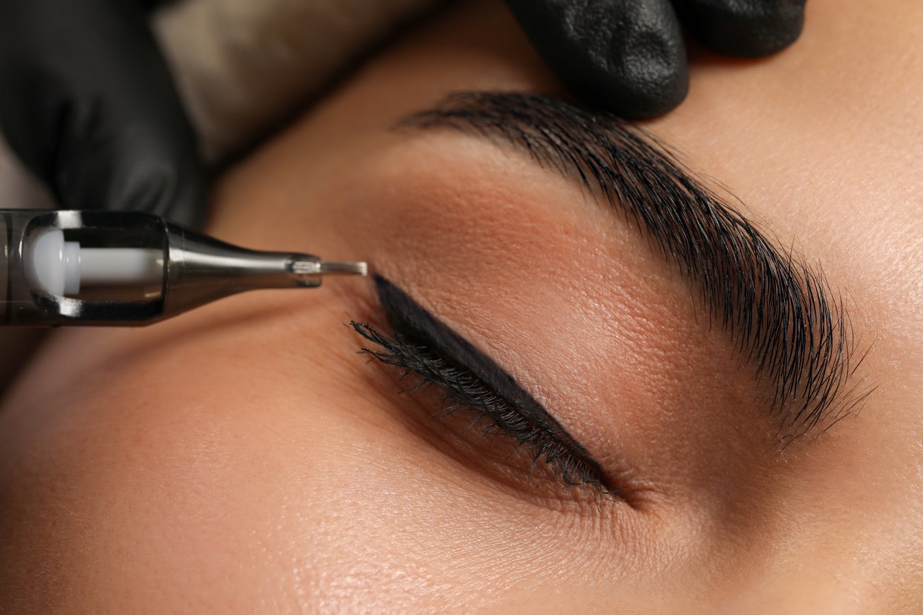 Young Woman Undergoing Procedure of Permanent Eyeliner Makeup, C